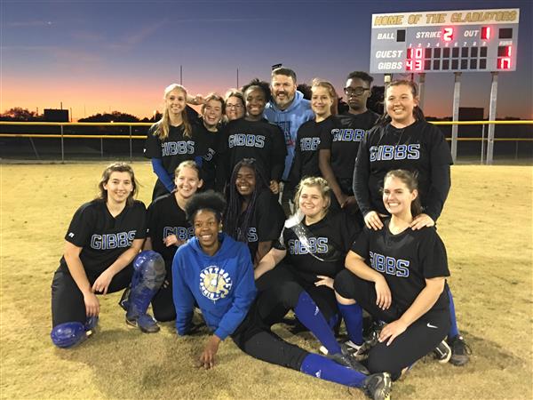 Gibbs Girls Softball team: team picture with winning scoreboard behind. Gibbs Girls Softball team: team picture with winning scoreboard behind.