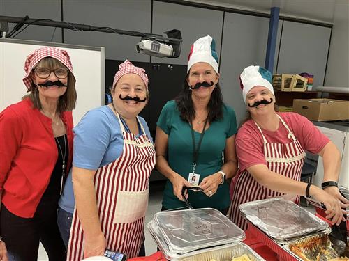 women serving food