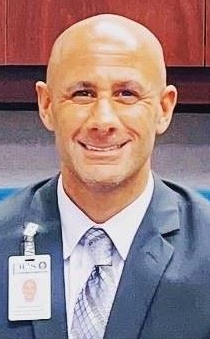  Mr. Andrew Akapnitis
