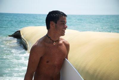 Sand, sun and the cut of the wave