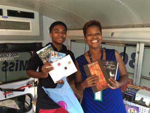 During a recent stop at Boca Ciega High School, teacher Maxine Nichols visited the bus with her students.  