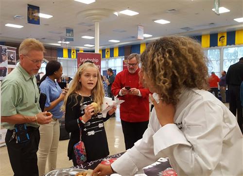 Students from Northeast High School Culinary Arts Academy share tasty treats at the Choice Fair 