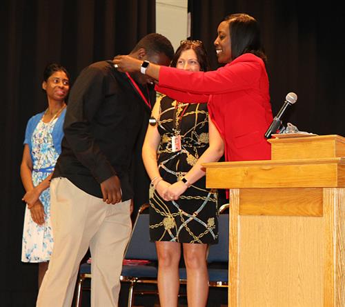 Clearwater Intermediate student getting medal.