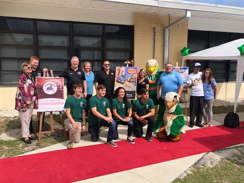 Students pose with local restaurants who will take part in Wally's Food Joint. 