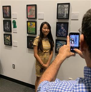 Student at the Surreal Exhibit 