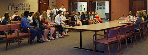 Studnets ask questions at the SR&R meeting. 