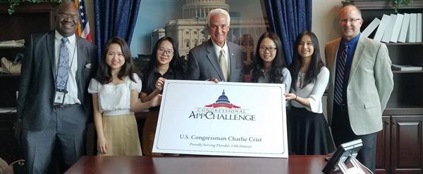 Students Yen Le, Oanh Le, Chau Nguyen and Thao Vo met with Congressman Crist.  