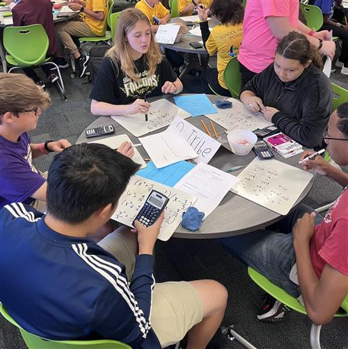 Students working on algebra problems