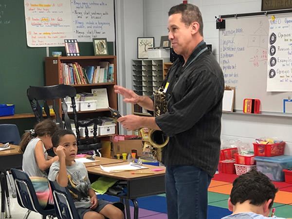 Plumb Elementary had a saxophone player visit during the Great American Teach In.