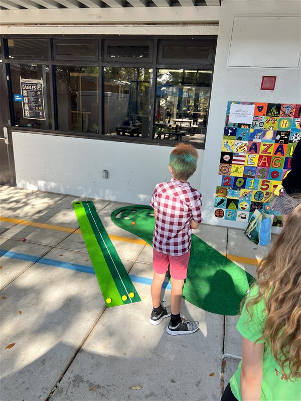 Students practicing their golf skills!