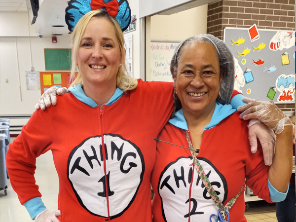 Walsingham Elementary School cafeteria staff, Ms. Tanya and Ms. Liz dressed up for Dr. Seuss's Birthday.