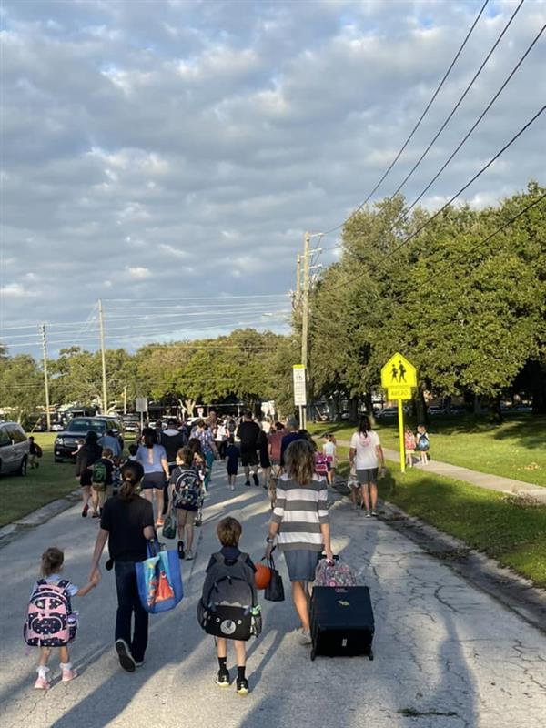 Families walk from Azalea Park to the school!