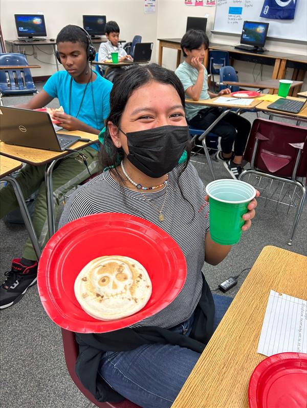 Student Roselyn Marcelino enjoying the celebration