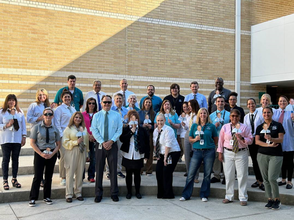 Carwise Elementary staff dressed like Mr. Eiben and carried around our Eiben Bobble Heads for principal's day.