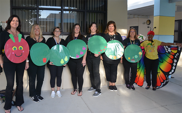 Teachers at Pasadena Fundamental Elementary dressed as The Very Hungry Caterpillar for Story Book Day.