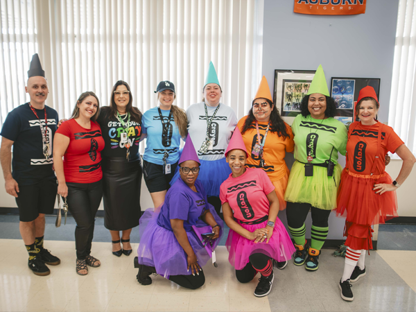 Azalea Middle 6th grade staff dressed up as crayons for Halloween.