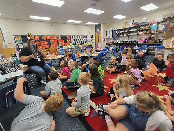 Third Grade and Kindergarten buddies at San Jose Elementary paired up on Halloween for a story and project.