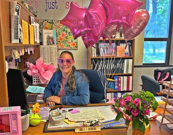 Eisenhower Elementary celebrated Ms. Hasson with flowers and balloons during National Assistant Principals Week.