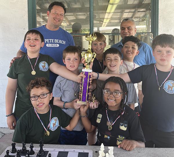M.K. Rawlings Elementary took home the 1st place trophy for group winners in the St. Petersburg Chess Club tournament.