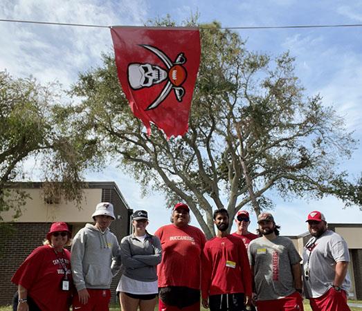 PE coaches Fisher, Gaskill and Huckno invited representatives from the Tampa Bay Buccaneers to put on a mini training camp for their students at Walsingham Elementary. 