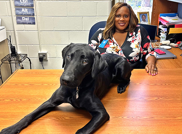 Eisenhower Elementary welcomed Officer Dan Sosa-Jones and 7th-month-old black Labrador, Rio, to the school.