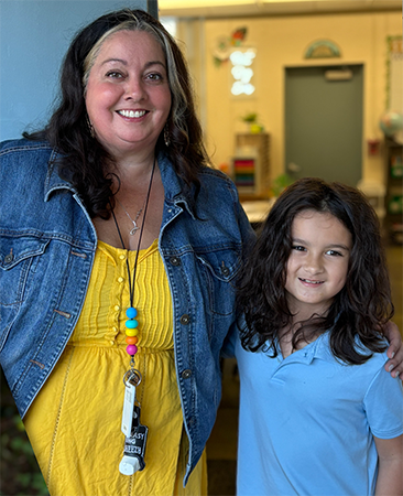 Student and teacher on the first day of school.