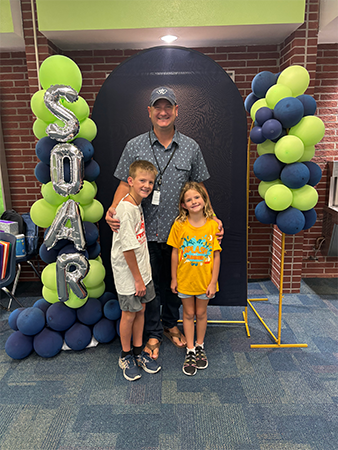Student and teacher on the first day of school.